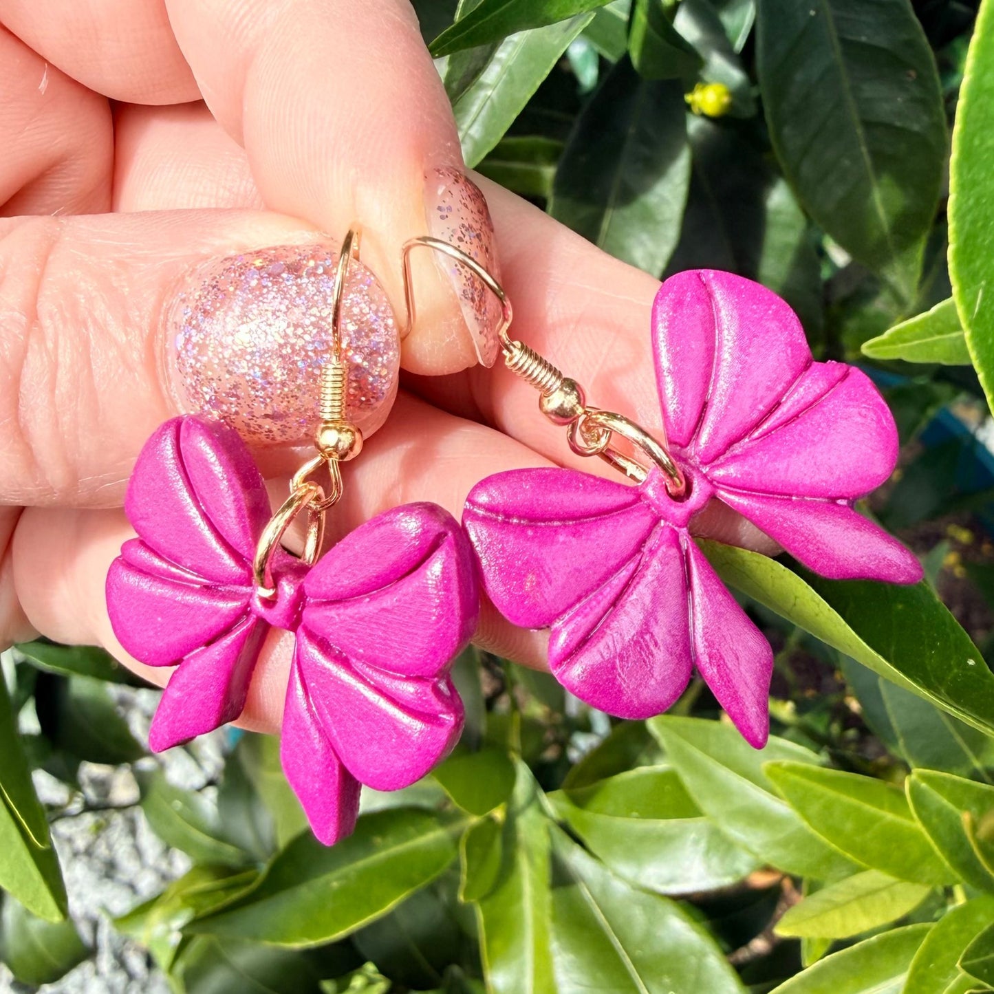 Handmade dangle earrings Cute Bows shown to scale