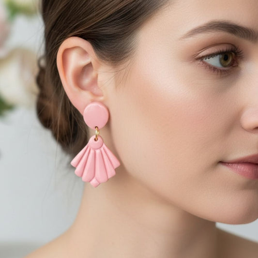 Australian handmade drop earrings Pretty Fan in a soft pink fan design worn on ear.