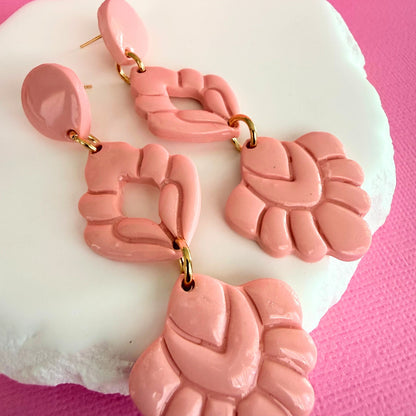 Close up of lightweight handmade drop earrings A Pink Affair