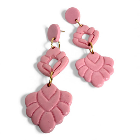 Pink polymer clay stud earrings inspired by vintage pastel tones.