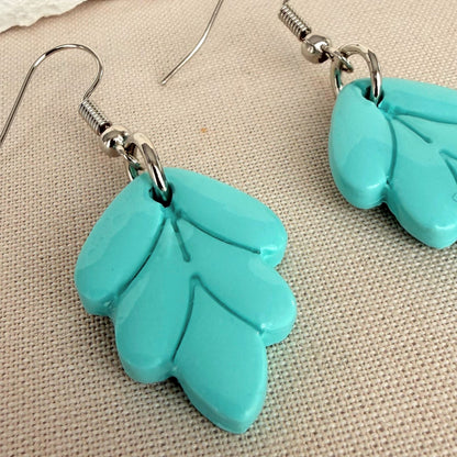 Close up of lightweight dangle earrings Aqua Leaf