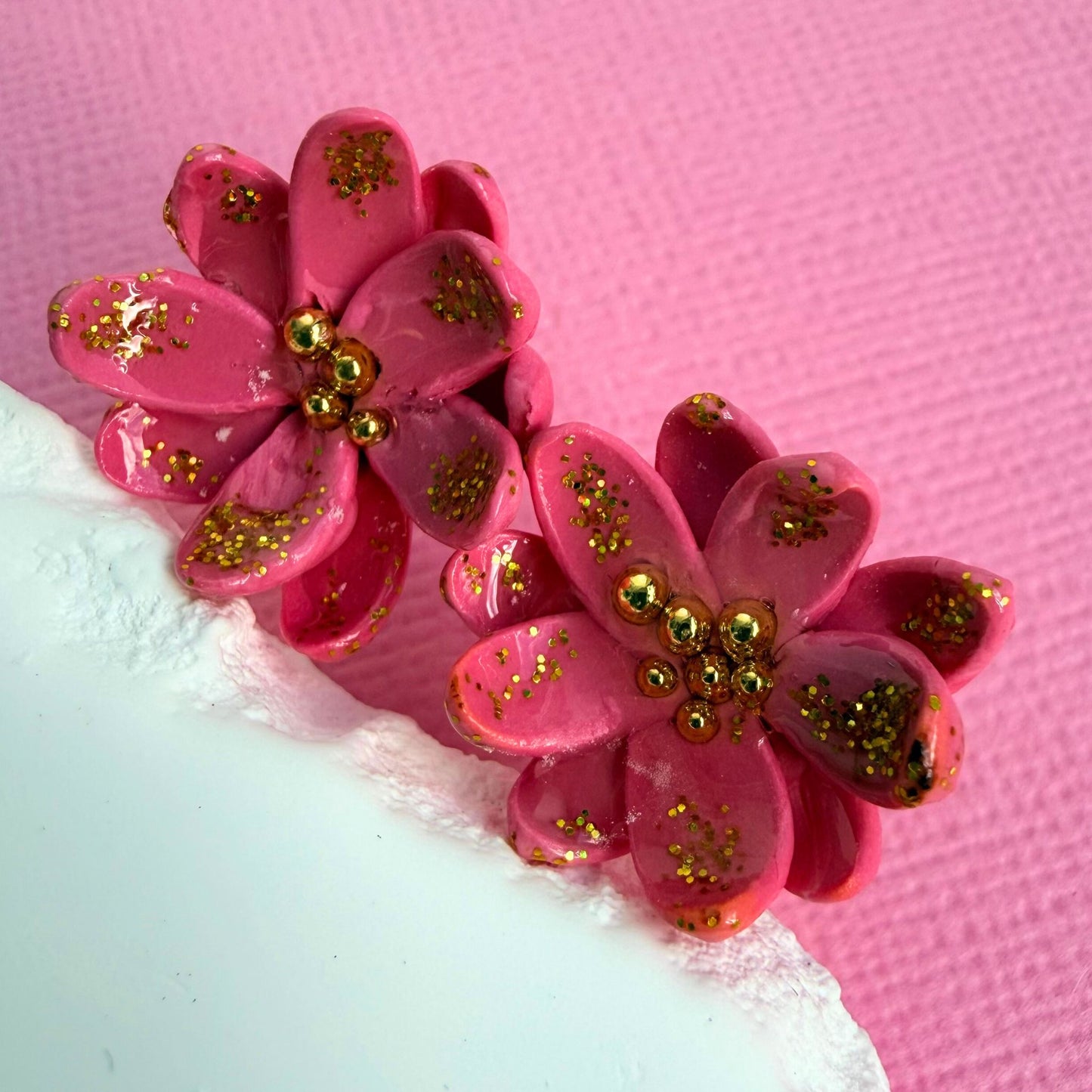 Close-up of lightweight handmade stud earrings Blush Petal Studs
