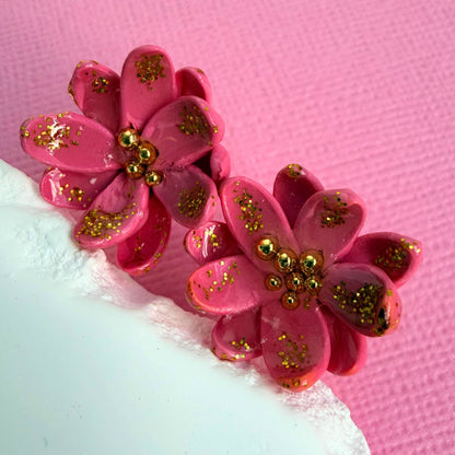Close-up of lightweight handmade stud earrings Blush Petal Studs