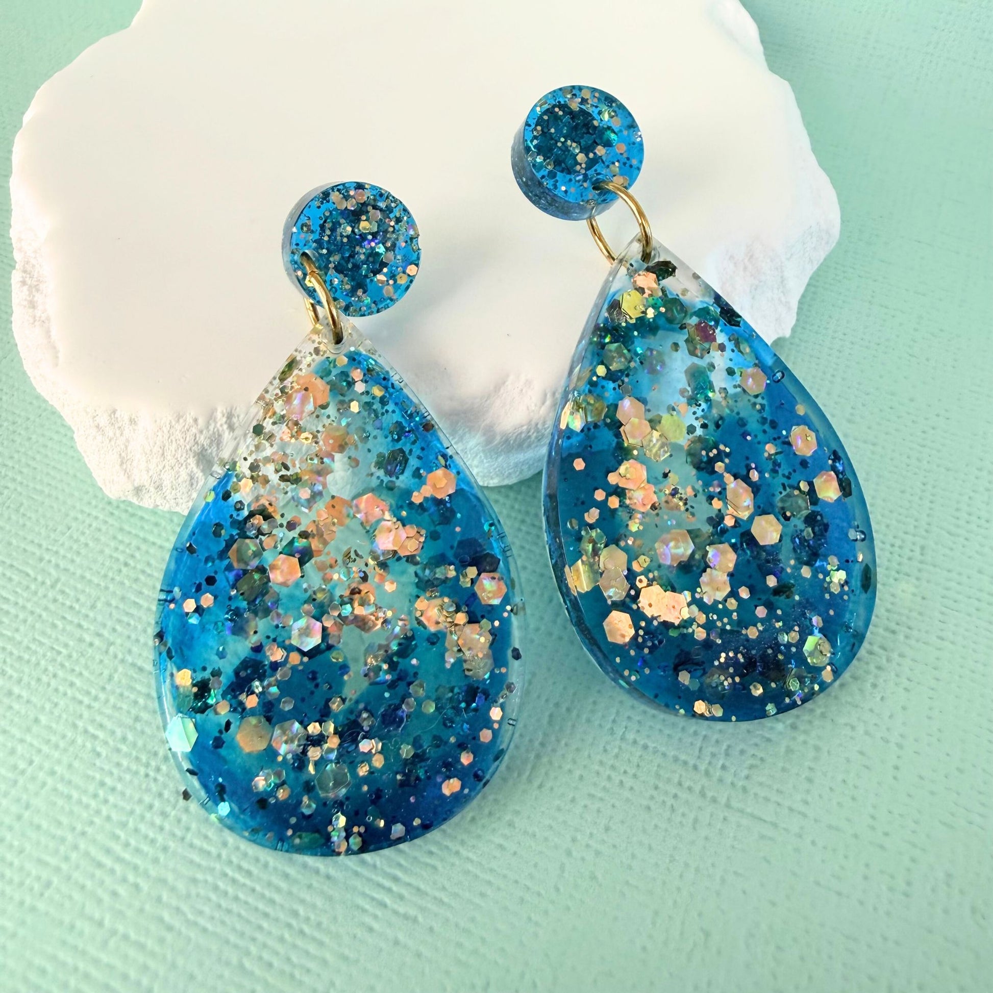 Australian handmade drop earrings Cerulean Sea with playful polymer clay pieces hanging from studs