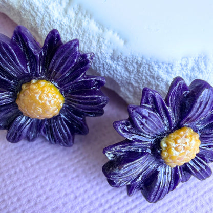 Close-up of lightweight handmade stud earrings Daisy Days