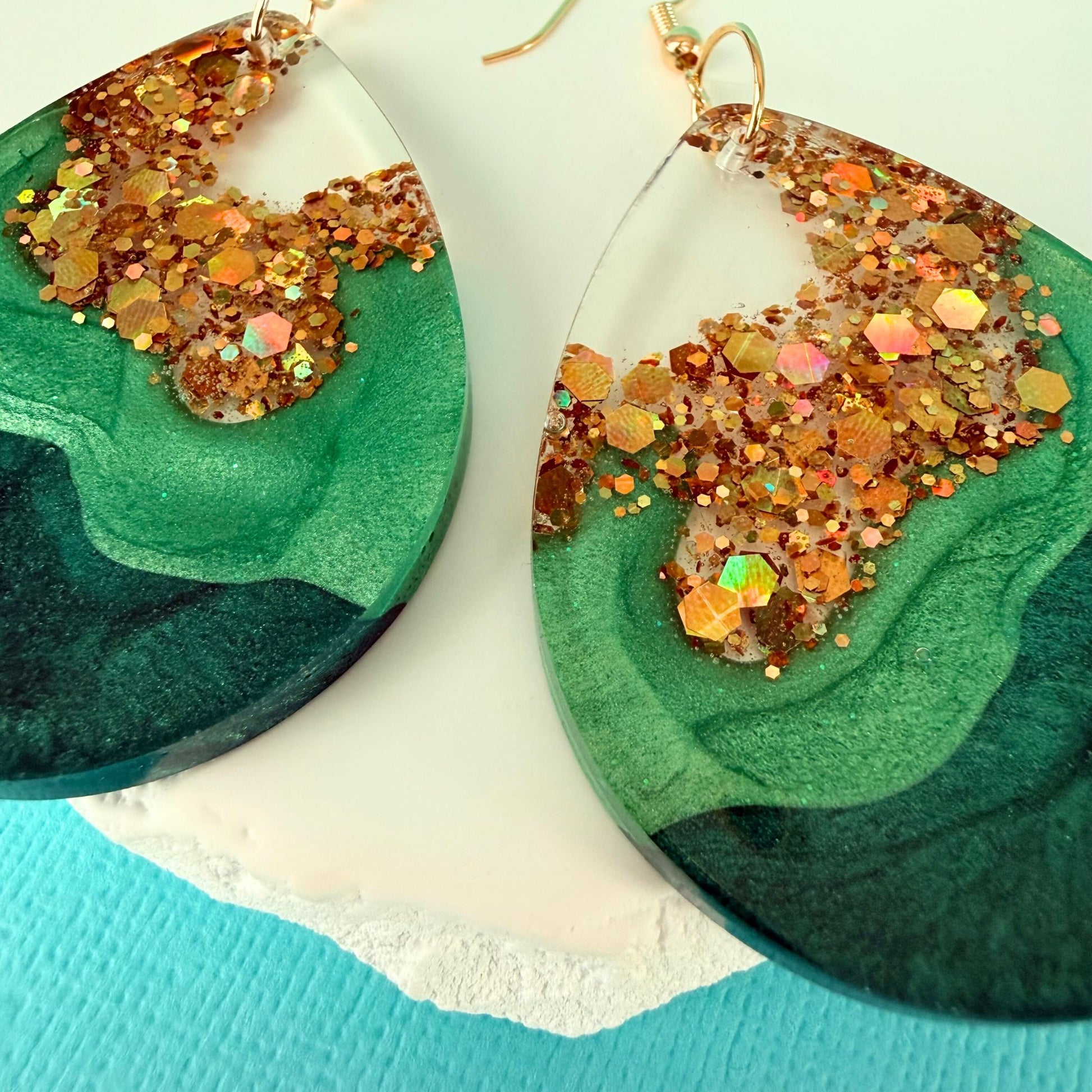 Close up of lightweight handmade statement earrings Emerald Geode