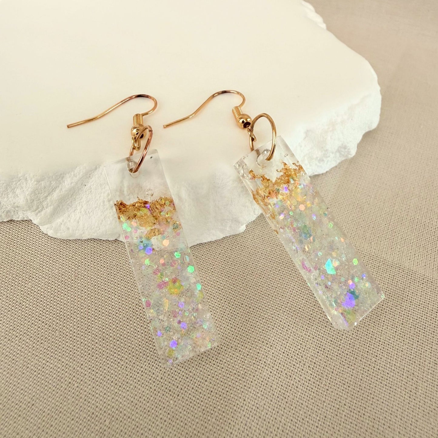 Australian handmade dangle earrings Gilded Shore - clear resin bar shaped earrings with embedded gold leaf and shimmer.