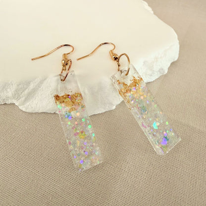 Australian handmade dangle earrings Gilded Shore - clear resin bar shaped earrings with embedded gold leaf and shimmer.