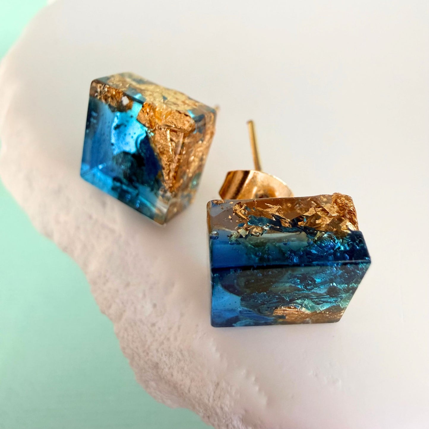 Close up of lightweight handmade stud earrings Gilded Tide