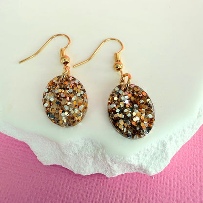 Australian handmade dangle earrings Golden Gleam with sparkly resin charms