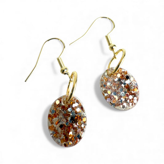 Golden Gleam gold and silver glitter resin dangle earrings on gold, nickel-free hooks