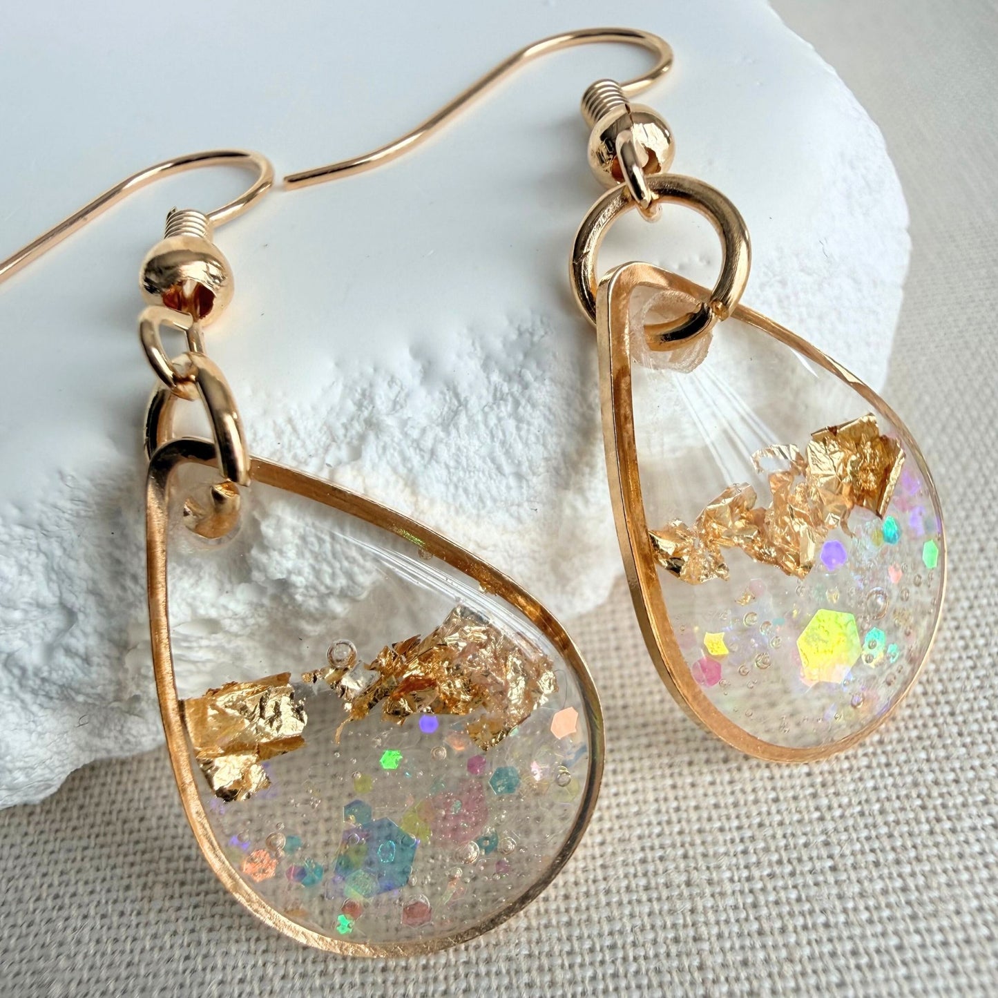 Close up of lightweight handmade earrings Golden Light