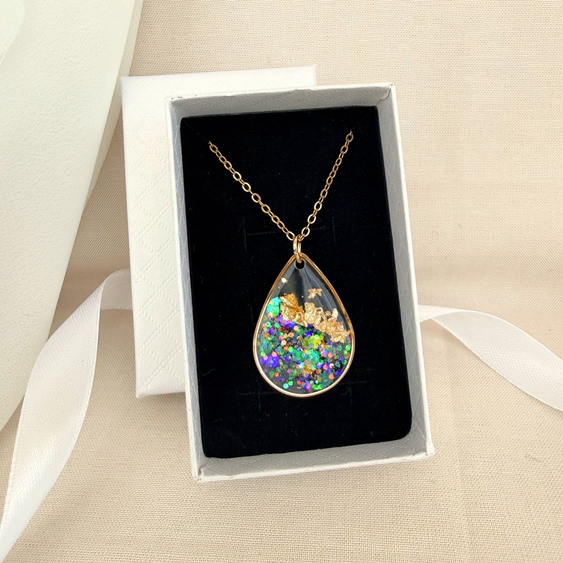 Australian handmade necklace Golden Light presented in gift box with ribbon.