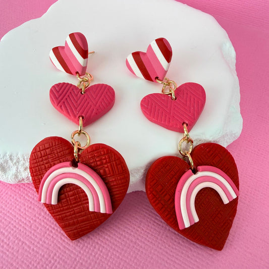 Australian handmade drop earrings Head Over Heels Hearts with playful polymer clay pieces hanging from studs