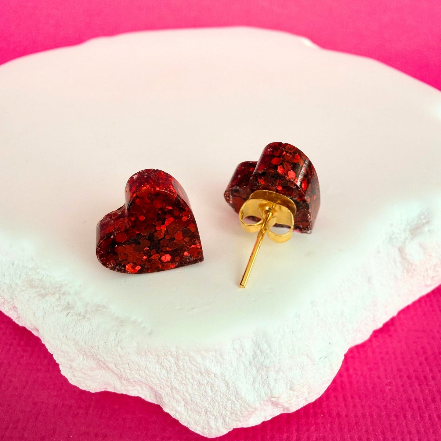 Handmade stud earrings Heartfelt Sparkle Studs shown in red colour option with gold findings