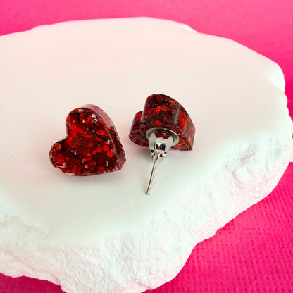 Handmade stud earrings Heartfelt Sparkle Studs shown in red colour option with silver findings