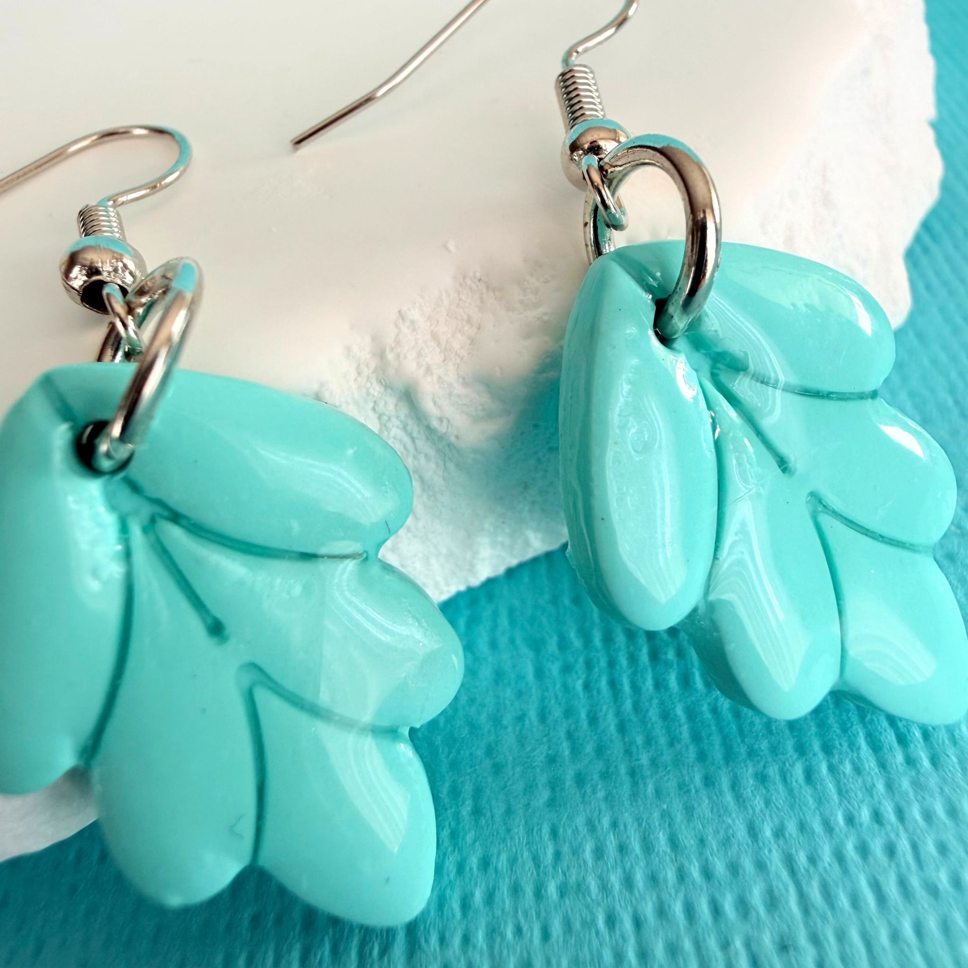 Close up of lightweight dangle earrings Mint Leaf