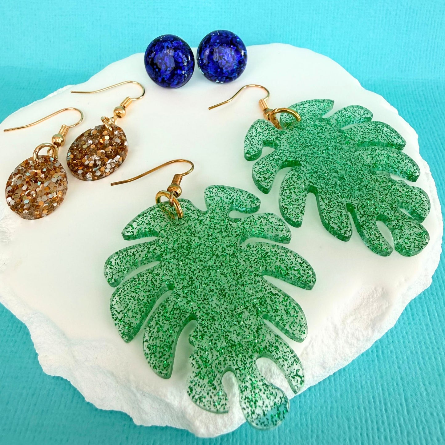 Australian handmade dangle earrings Monstera Magic styled with other Katie Tilson Studios earrings