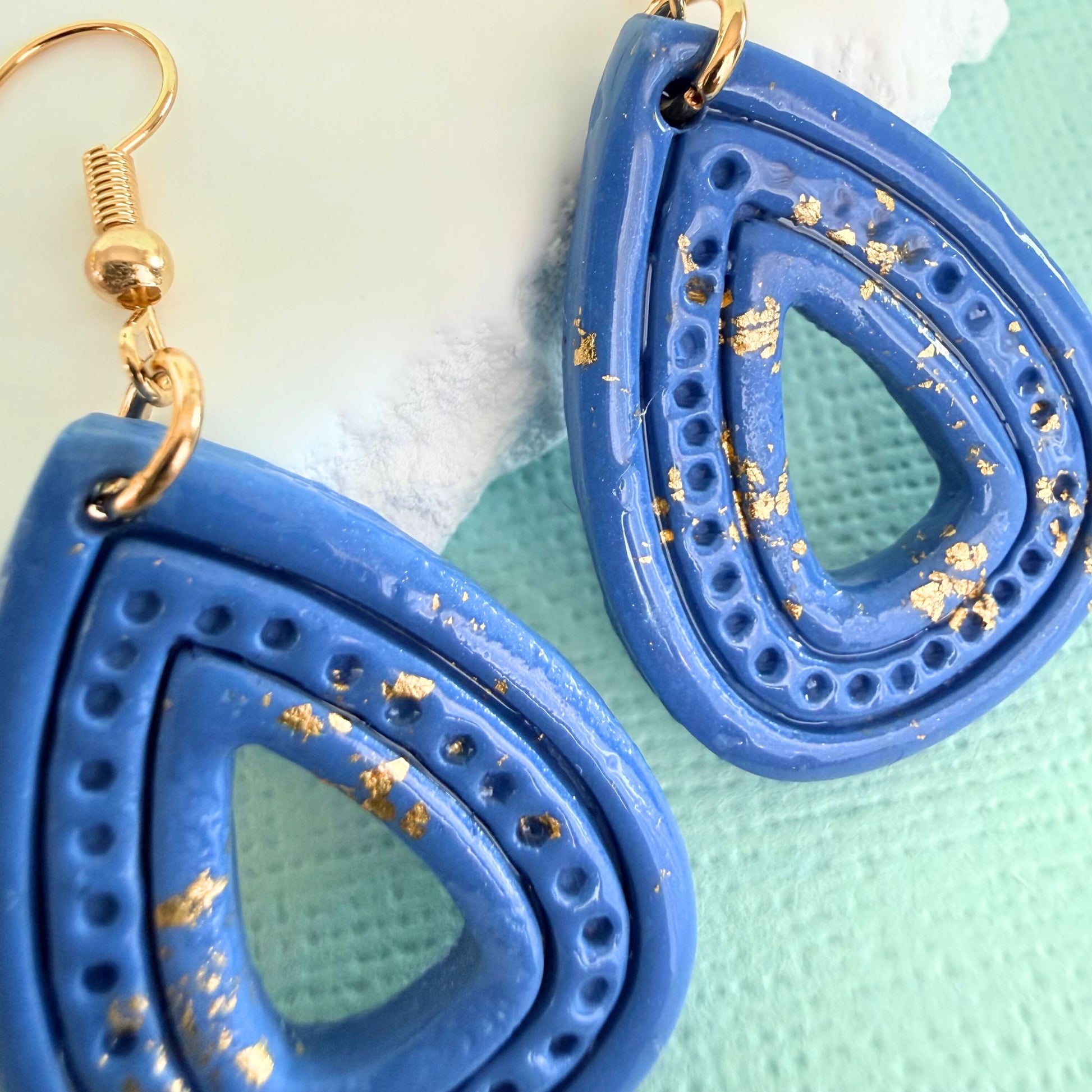 Close up of lightweight handmade dangle earrings Ocean Gleam Teardrops