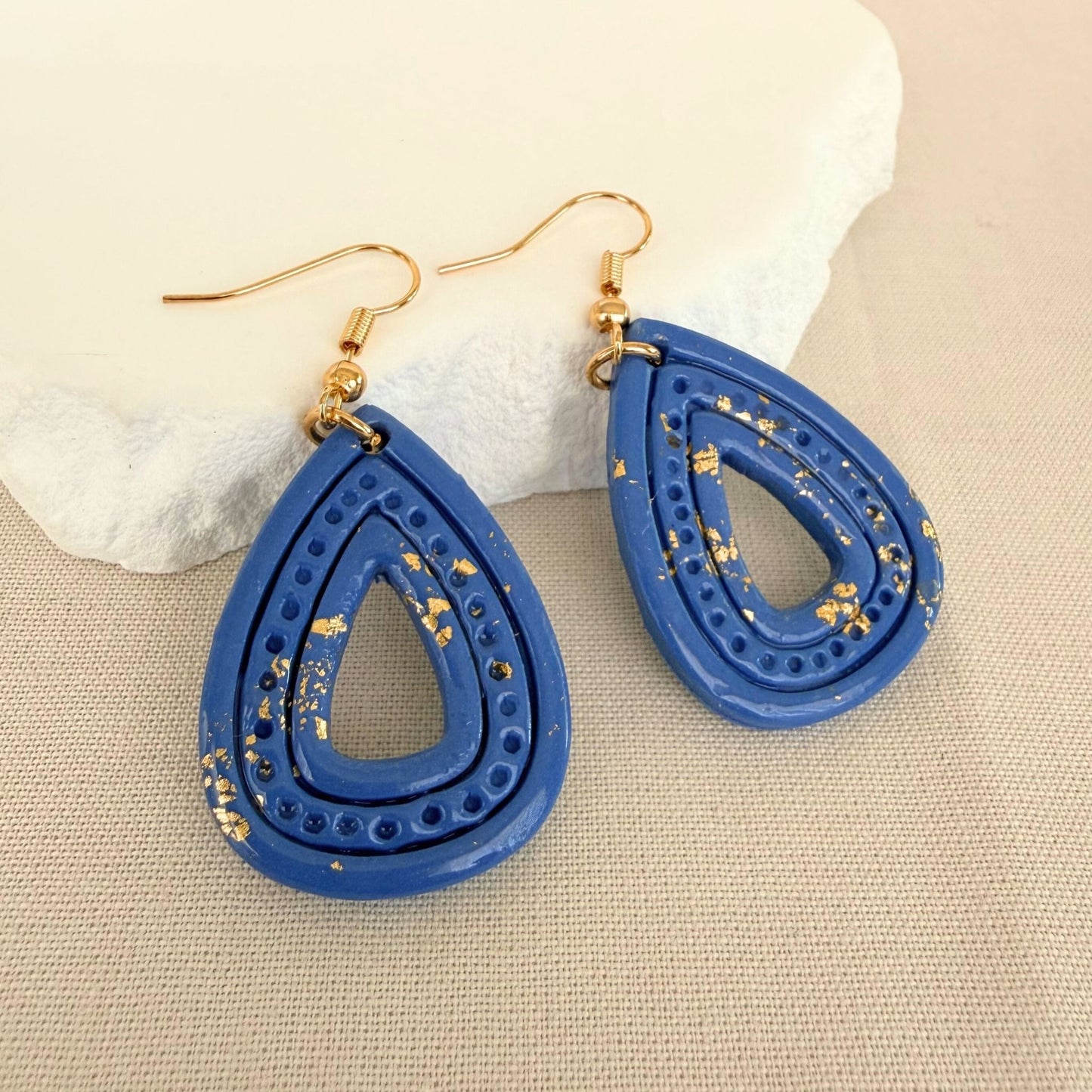 Australian handmade dangle earrings Ocean Gleam Teardrops in mid blue with gold leaf details.