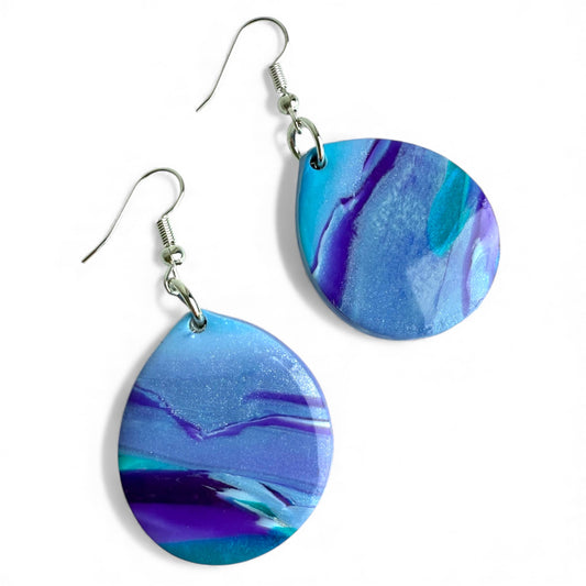 Pastel polymer clay dangle earrings inspired by beachy ocean waves.