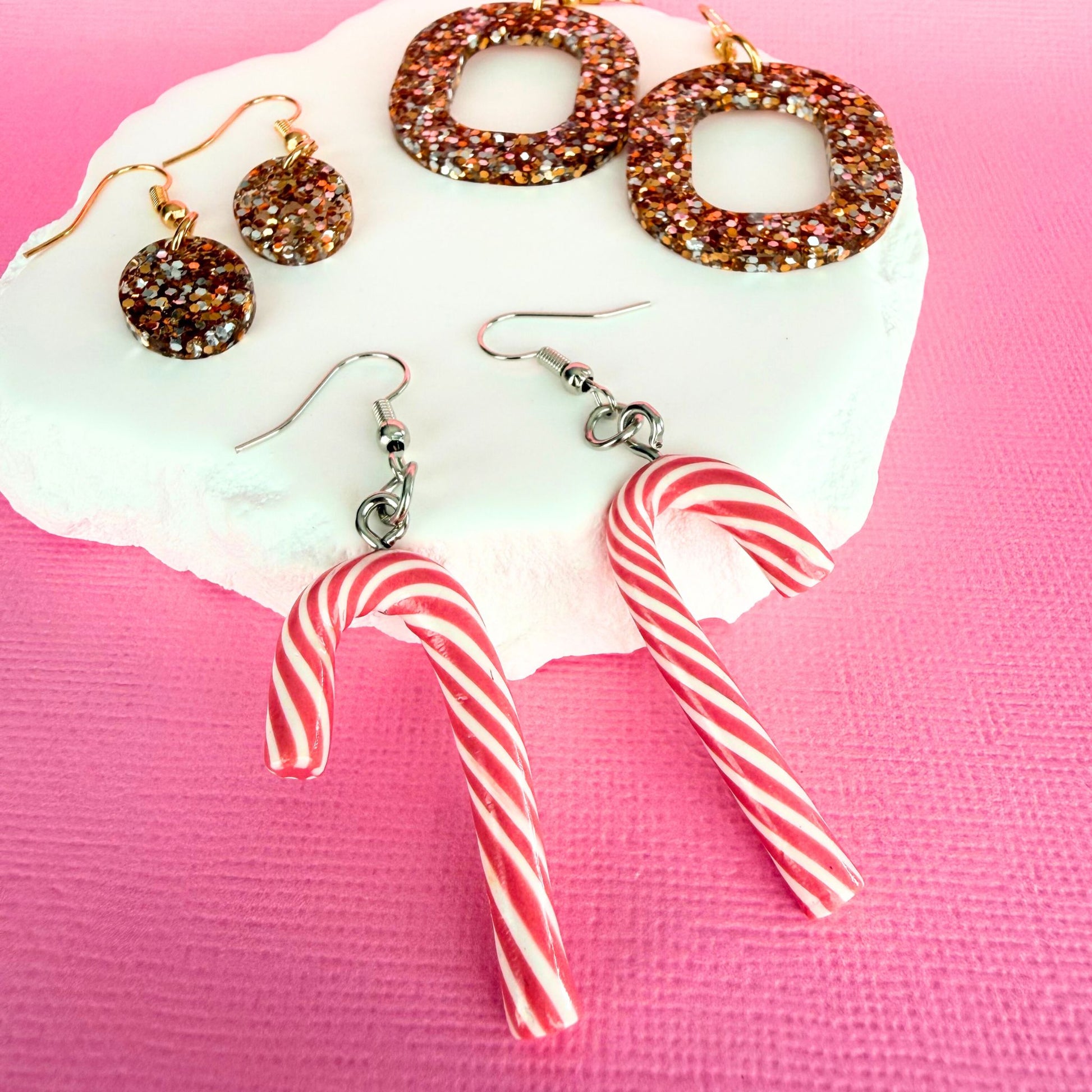 Australian handmade dangle earrings Pink Peppermint Candy Canes styled with other Katie Tilson Studios earrings