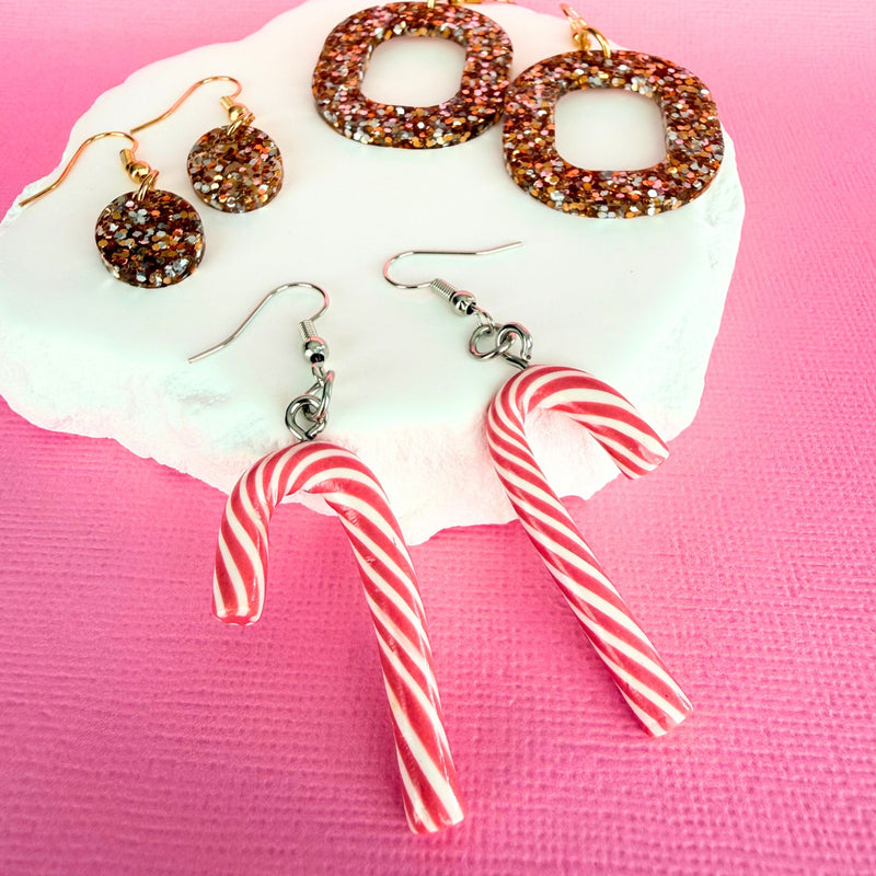 Australian handmade dangle earrings Pink Peppermint Candy Canes styled with other Katie Tilson Studios earrings
