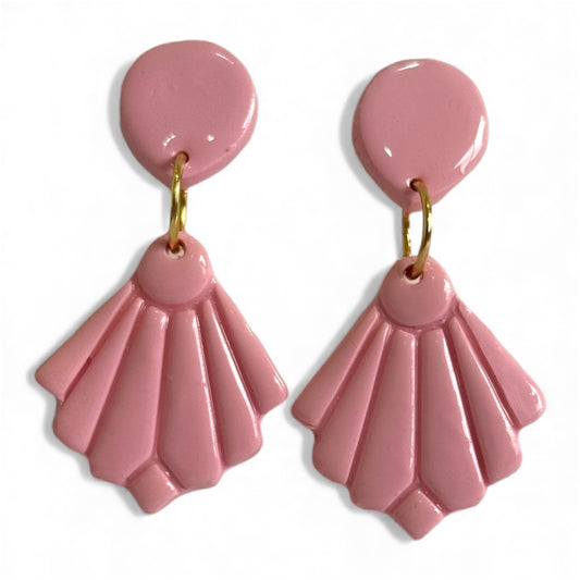Vintage-inspired polymer clay fan stud earrings in soft pastel pink.