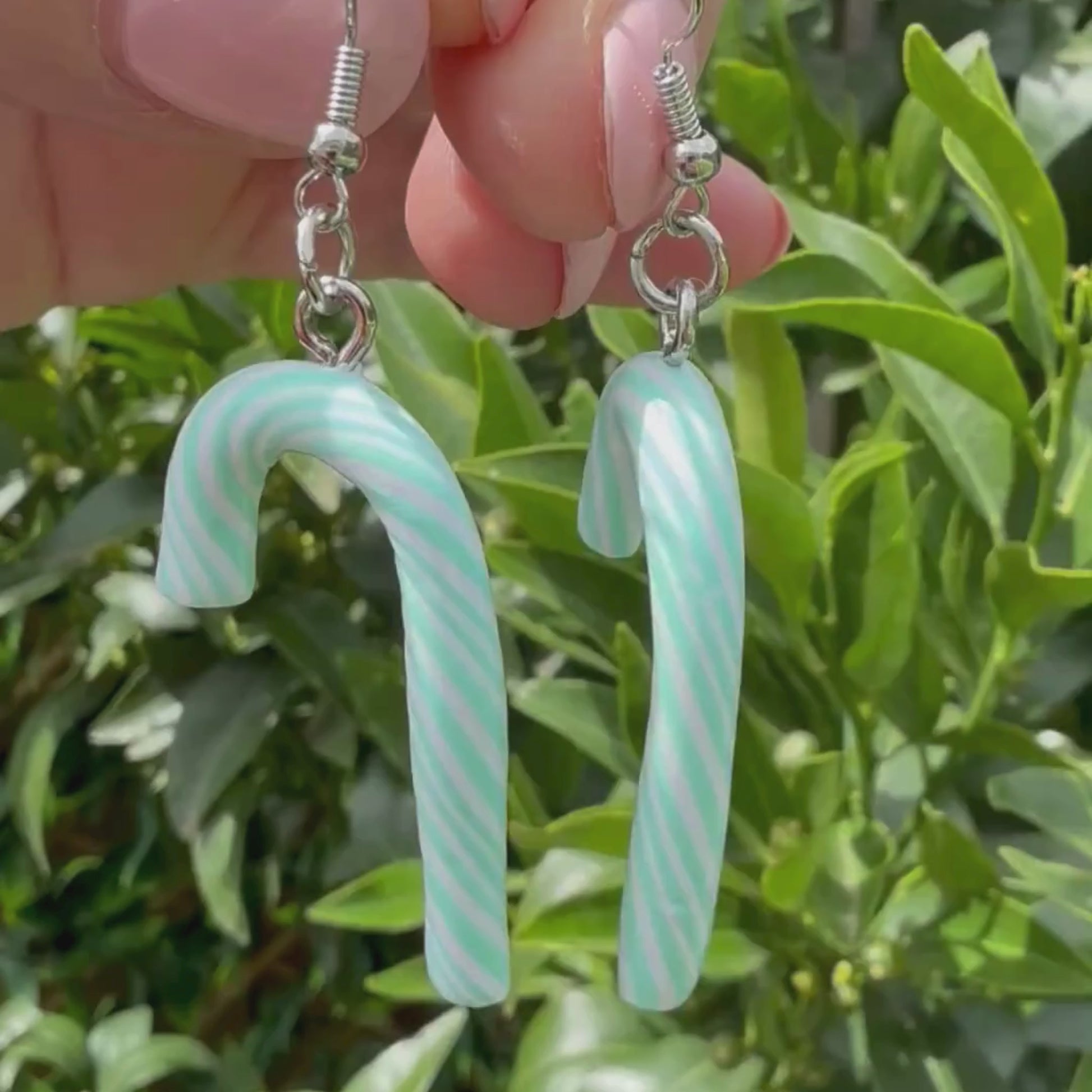 Video of Australian handmade dangle earrings Mint Frost showing playful movement