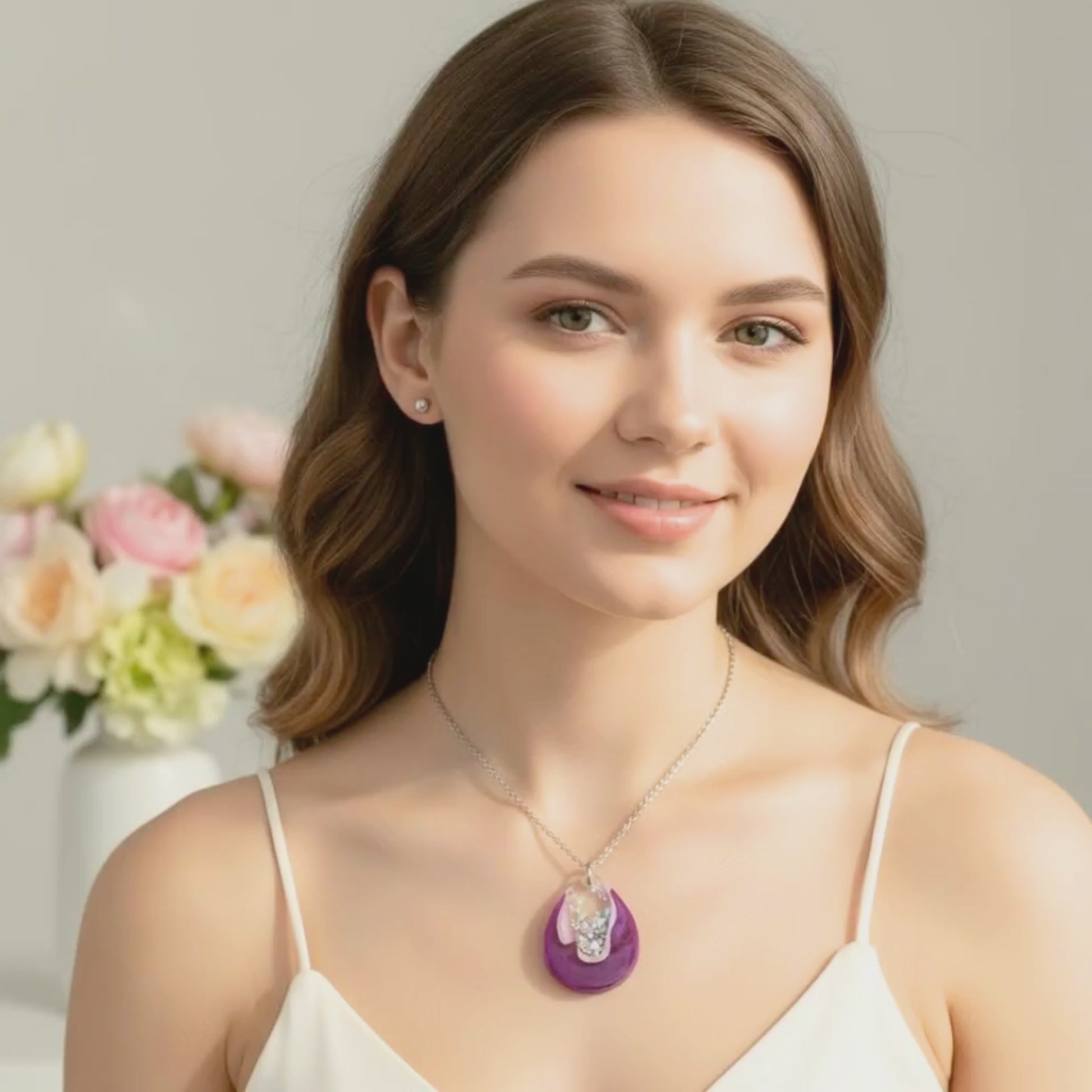 Video of Australian handmade statement necklace Pink Geode worn showing movement and sparkle