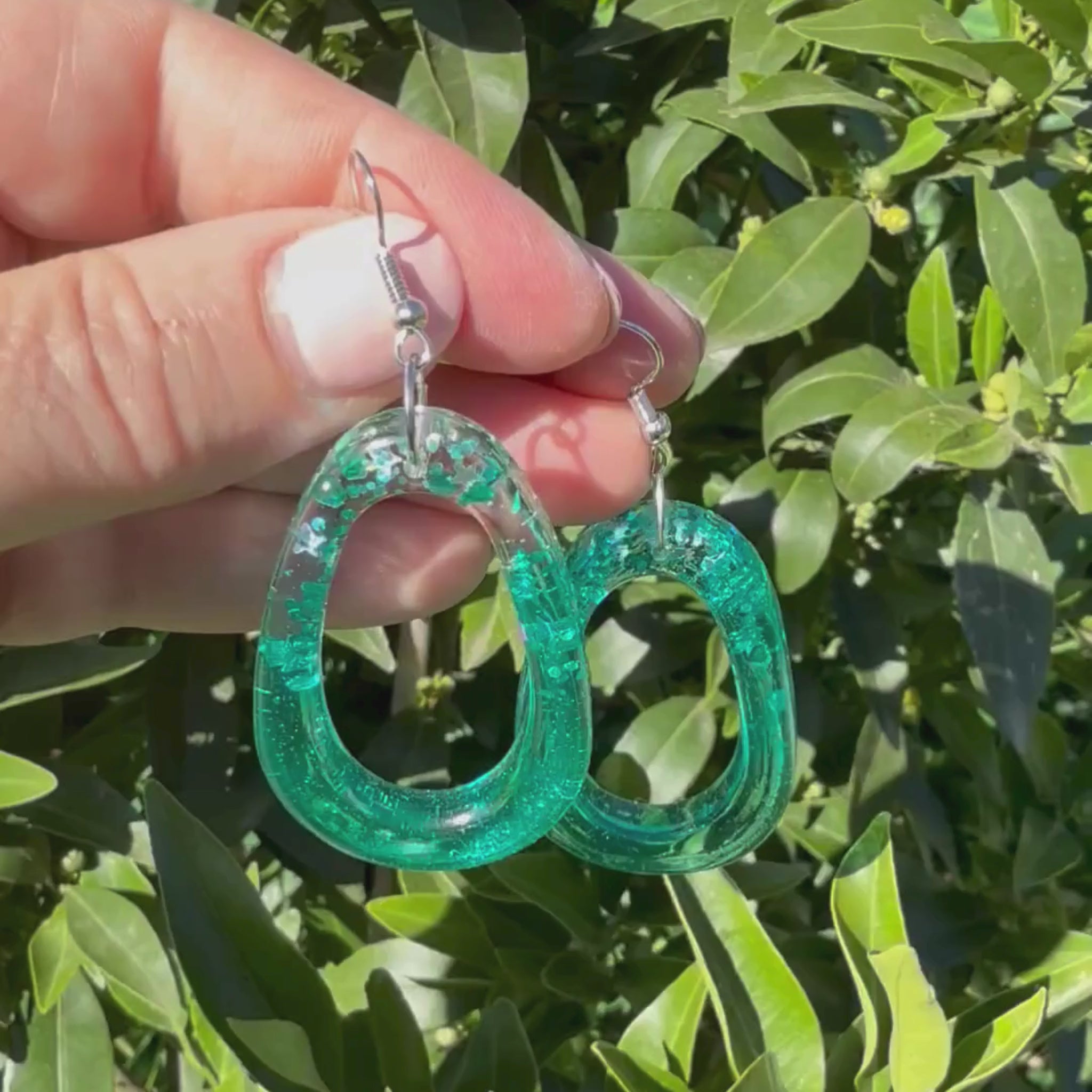 Video of Australian handmade dangle earrings Tidal Glow Ovals showing playful movement