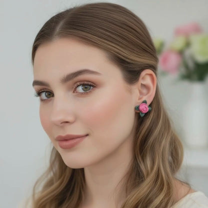 Video of Australian handmade stud earrings Swet Rose in pink showing movement