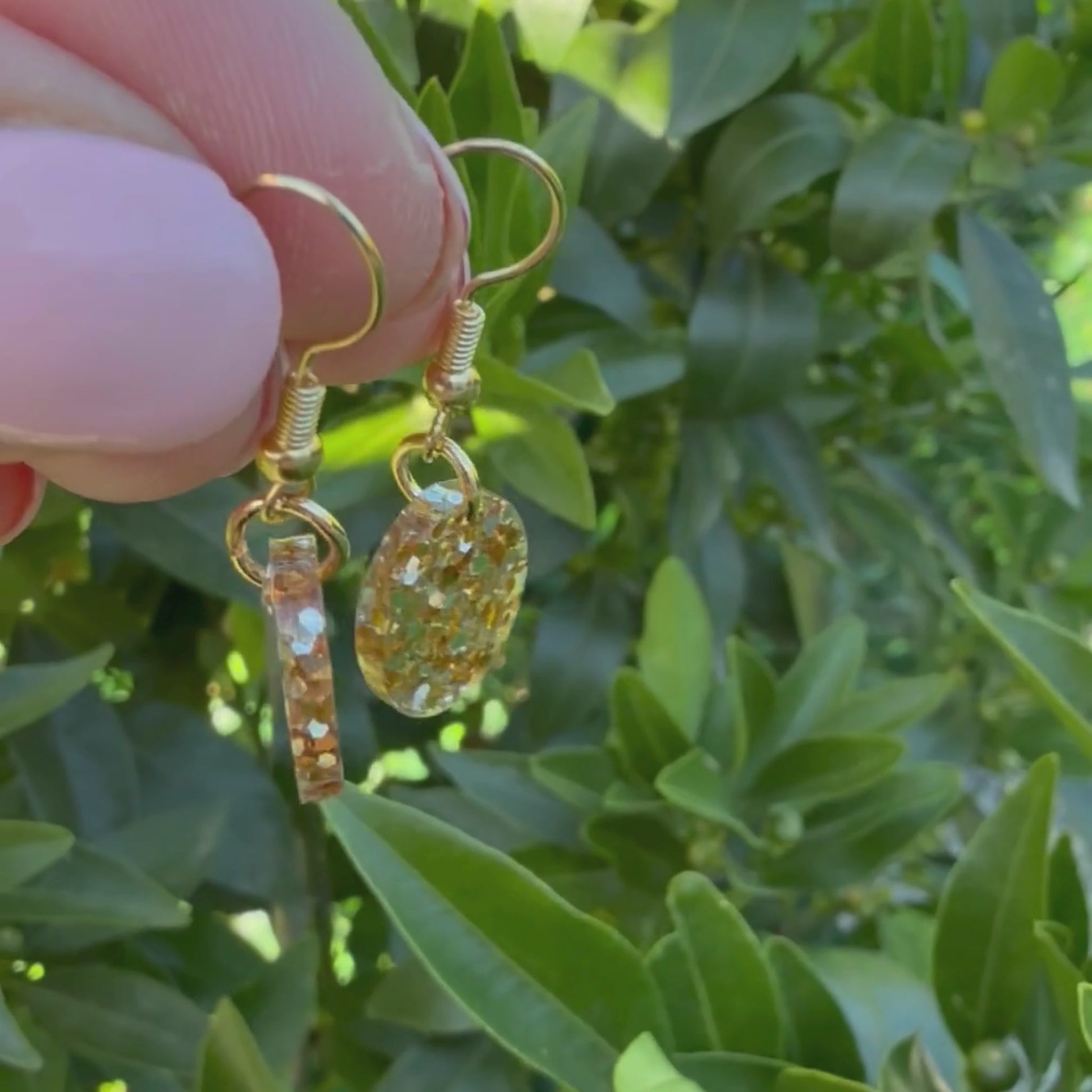 Video of Australian handmade dangle earrings Golden Gleam showing playful movement