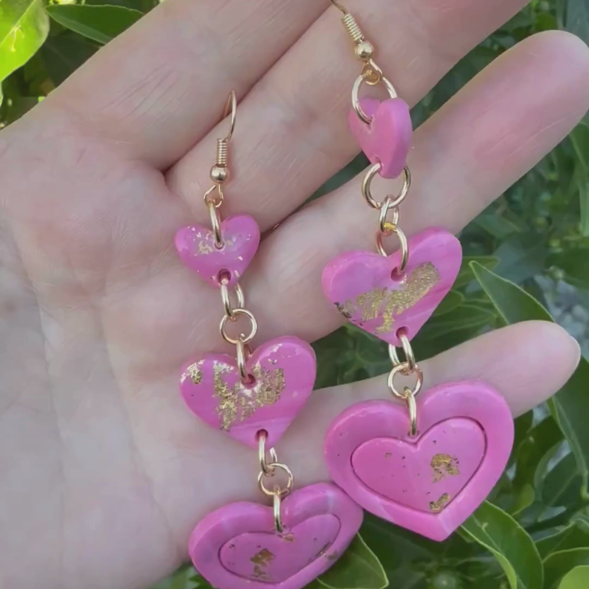 Video of Australian handmade dangle earrings Love Letter showing playful movement