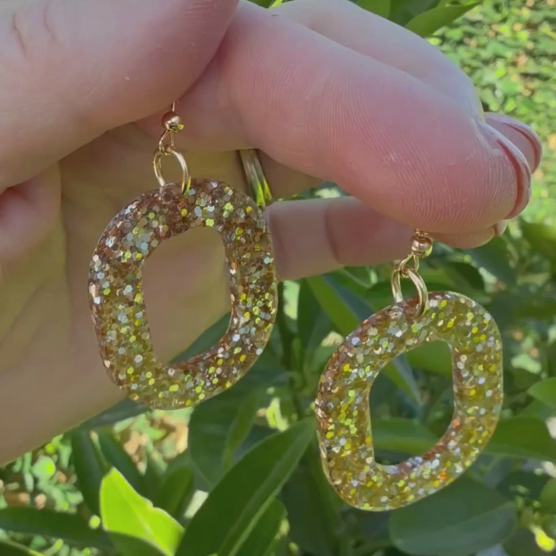 Video of Australian handmade dangle earrings Gold Digger showing playful movement