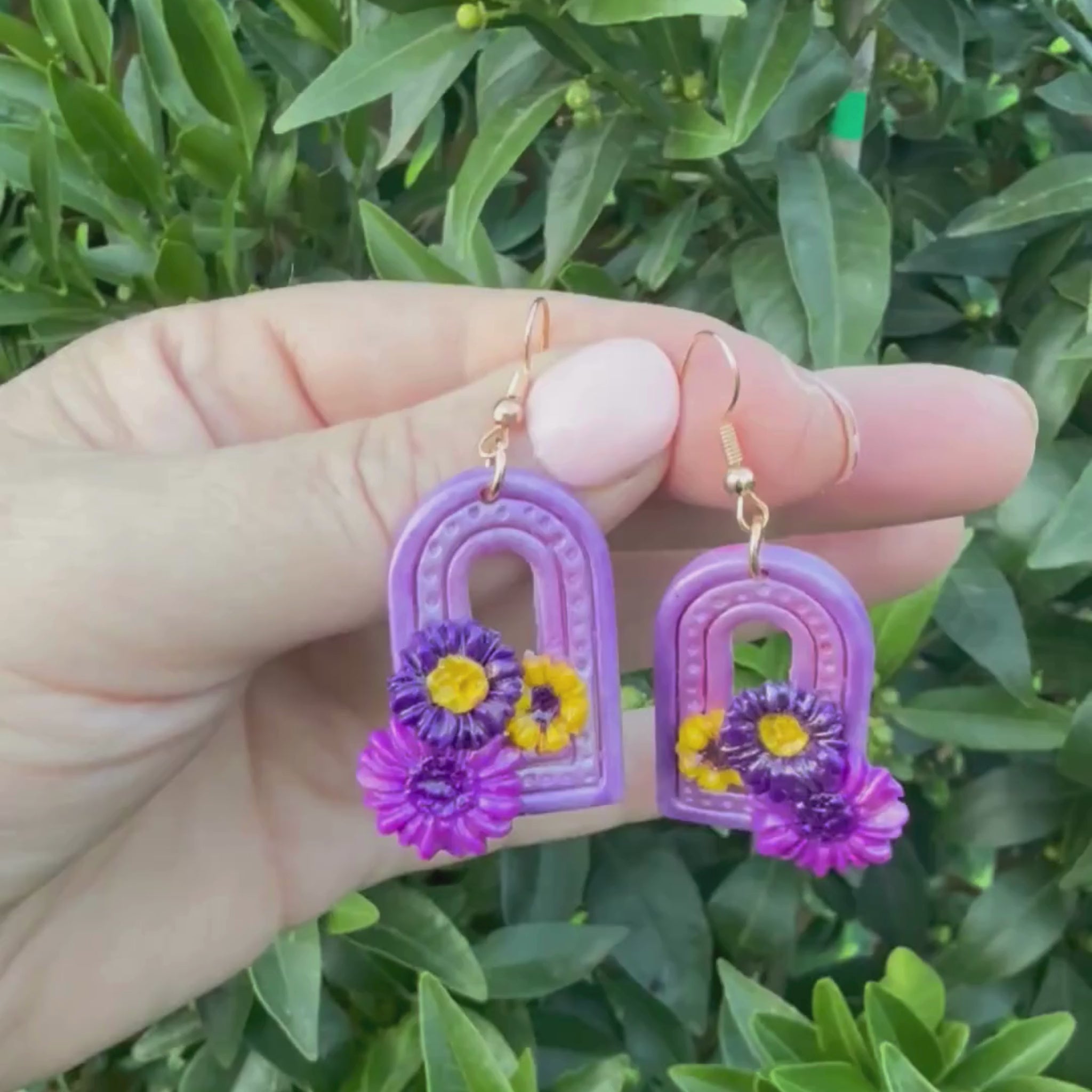 Video of Australian handmade dangle earrings Sweet Arch showing playful movement