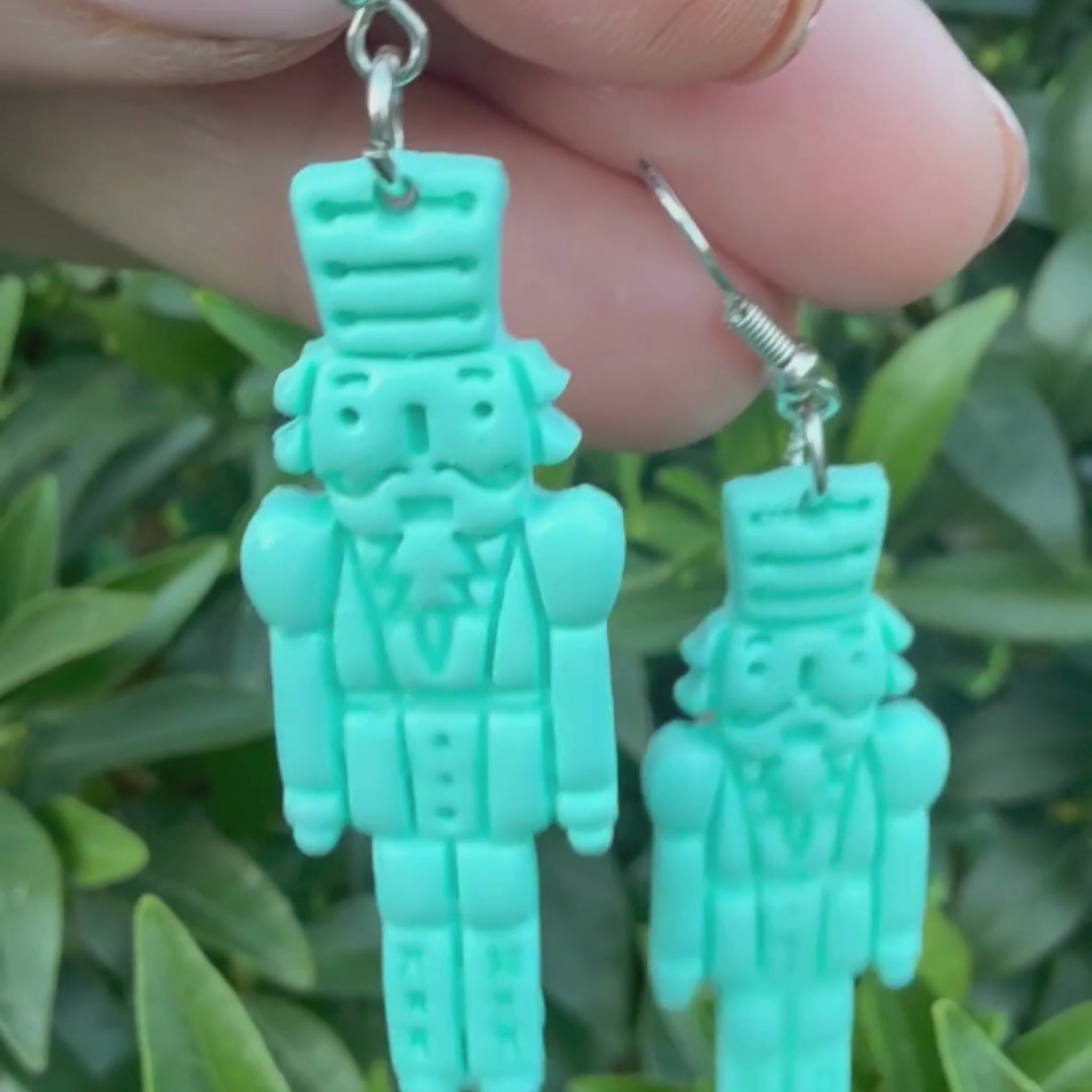 Video of Australian handmade dangle earrings Mint Cracker showing playful movement