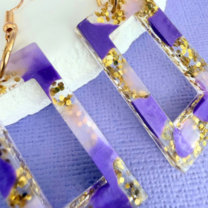 Close up of lightweight handmade dangle earrings Purple Haze