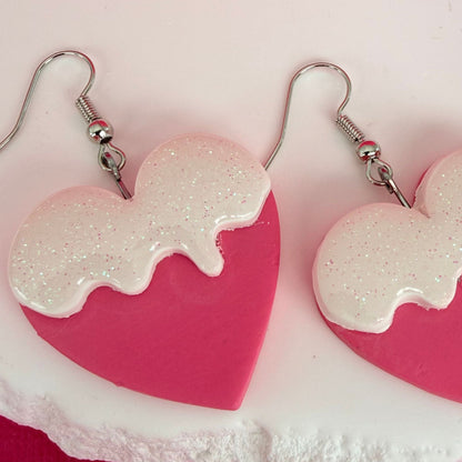 Close-up of lightweight handmade dangle earrings Sugar Drip Hearts
