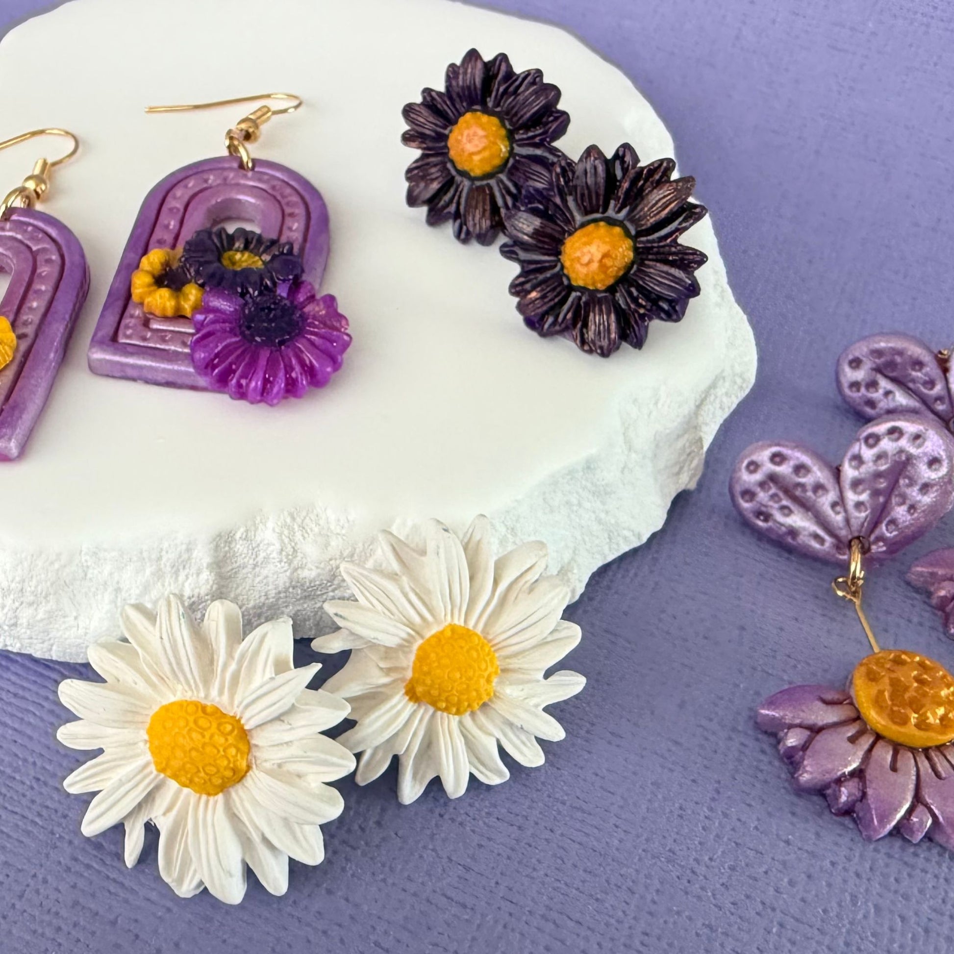 Australian handmade stud earrings Sunny Meadow Daisy Studs styled with other Katie Tilson Studios earrings