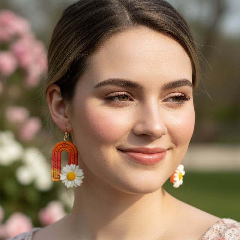 Australian handmade dangle earrings Sunrise Daisy Arches worn by model for joyful everyday style