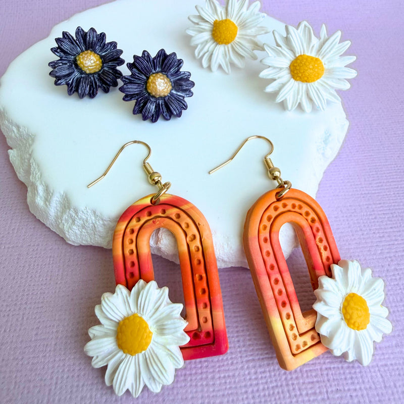 Australian handmade dangle earrings  Sunrise Daisy Arches styled with other Katie Tilson Studios earrings