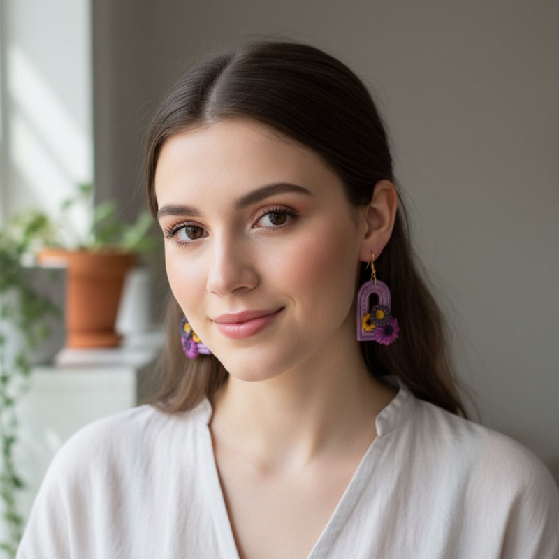 Australian handmade dangle earrings Sweet Arch worn by model showing playful movement