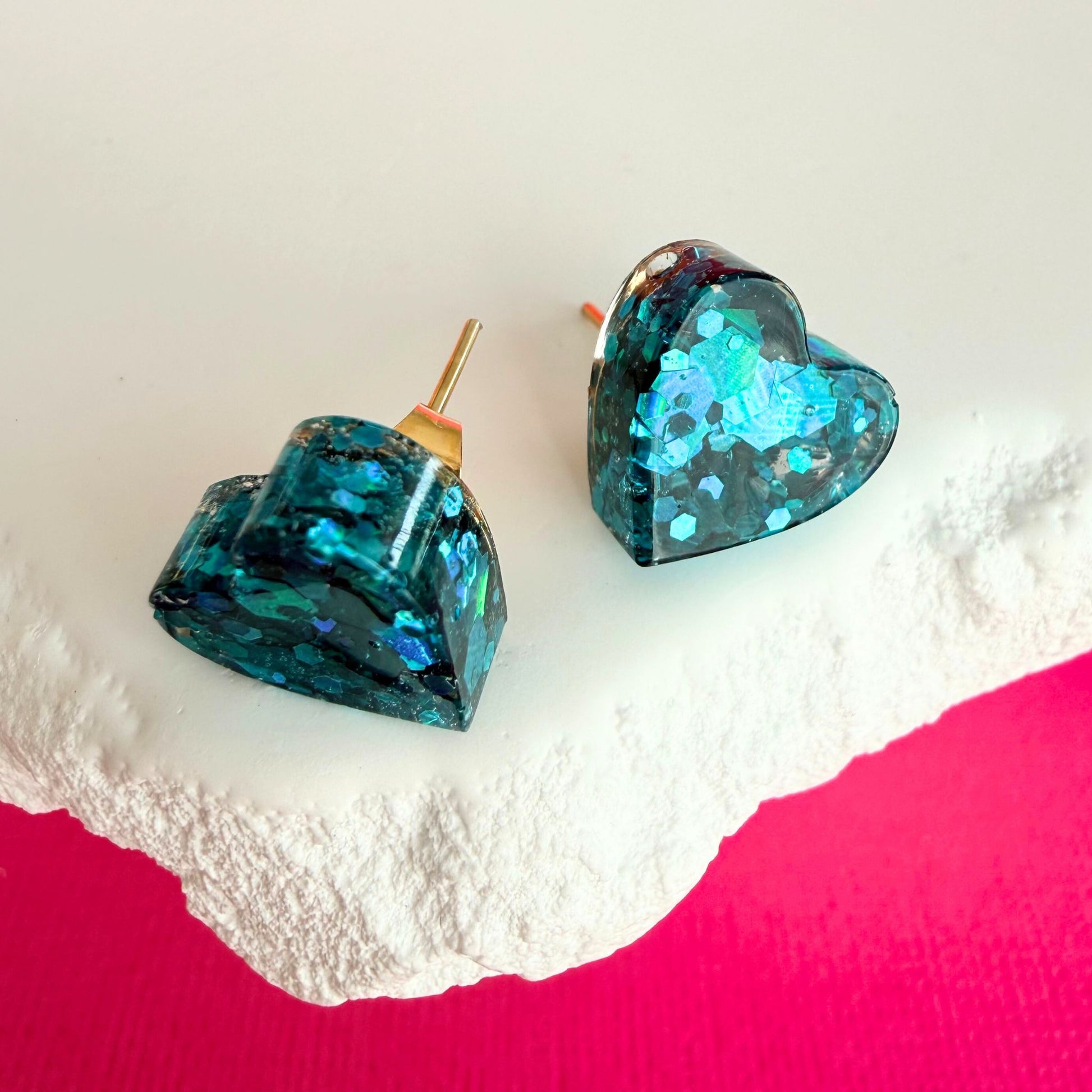 Australian handmade stud earrings Teal Heart in playful resin sparkle