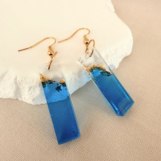 Australian handmade dangle earrings Tidal Bar in blue and transparent resin with embedded gold leaf details