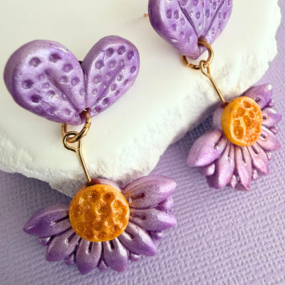 Close up of lightweight handmade drop earrings Violet Bloom
