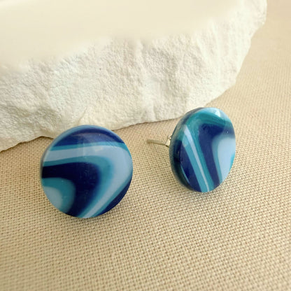 Handmade stud earrings Wavelength in a coastal blues striped wave design.